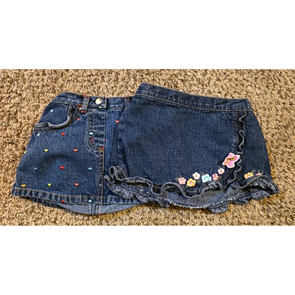 lots of two Gymboree jean skirts 12 to 18 months